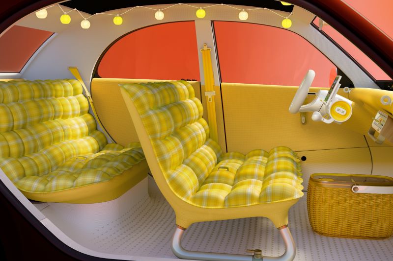 Retro-Charme im Citroën 2CV Concept: Gelb karierte Sitzbänke, ein herausnehmbarer Aufbewahrungskorb und eine Lichterkette prägen den Innenraum der neuen Elektro-Ente. © Citroën