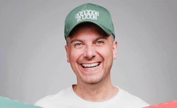 Der Berliner Zwei-Sterne-Koch und aus "Kitchen Impossible" bekannte TV-Gastronom Tim Raue startet ein neues Format in der Systemgastro. © Spizza Pizza