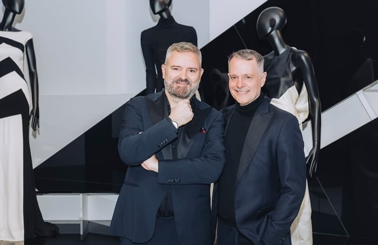 Adrian Runhof und Johnny Talbot am Freitag, 17. April 2026 im tim Augsburg bei der Eröffnung von "Celebrating Fashion"