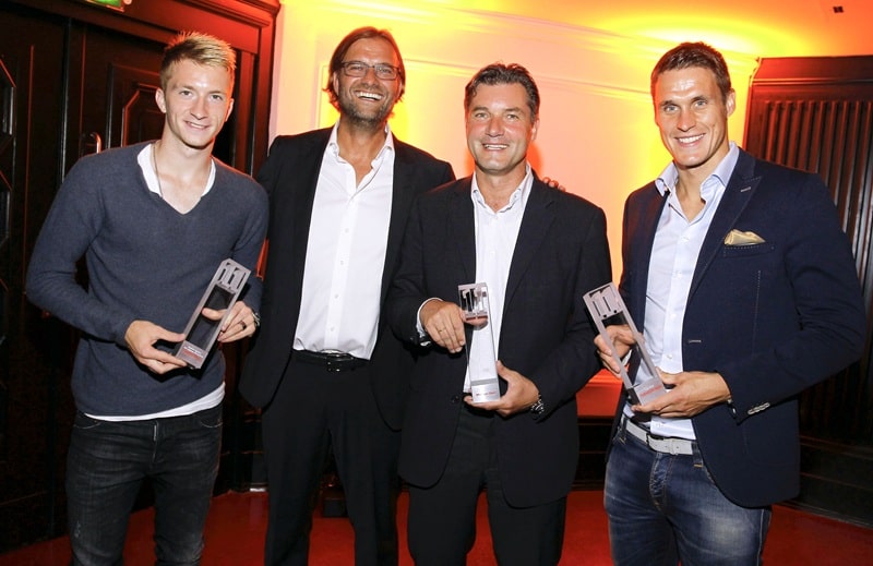 Seine erfolgreichste Zeit in Deutschland hat Jürgen Klopp (bisher) bei Borussia Dortmund erlebt - hier bei der 11-Freunde-Meisterfeier im Curio-Haus in Hamburg am 03. August 2012 mit Marco Reus, Michael Zorc und Sebastian Kehl (Brauer Photos)